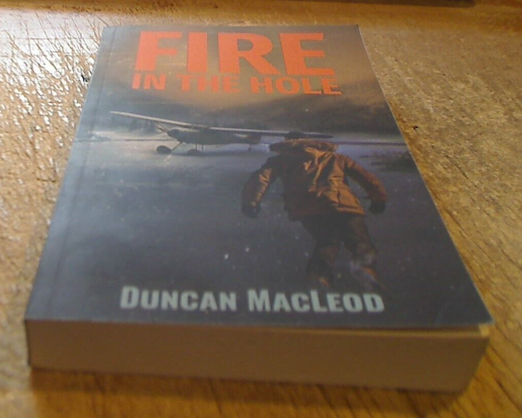 LIKE NEW – Fire in the Hole by Duncan MacLeod – Paperback, 340 pages