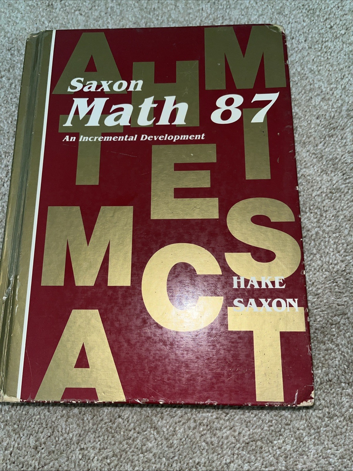 Math 87 : An Incremental Development by Stephen Hake and John Saxon (1991,…