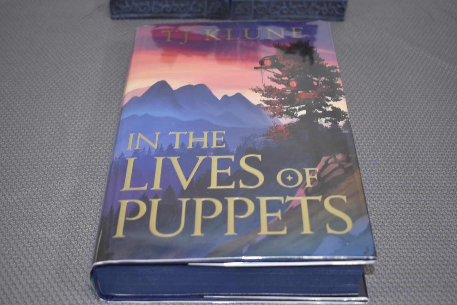 In The Lives of Puppets by T.J. Klune(Fairyloot, signed, imaged edges,hardcover)