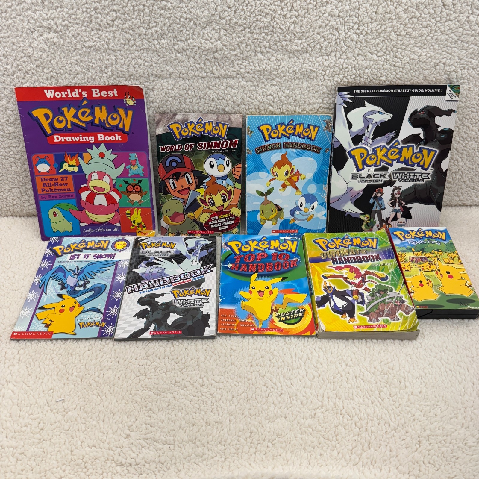 Lot of 8 Pokémon Books + VHS – Drawing, Sinnoh, Black & White Strategy Guide