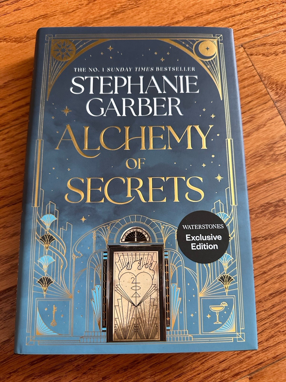 UNsigned Waterstones Alchemy Of Secrets By Stephanie Garber Ticket Cover
