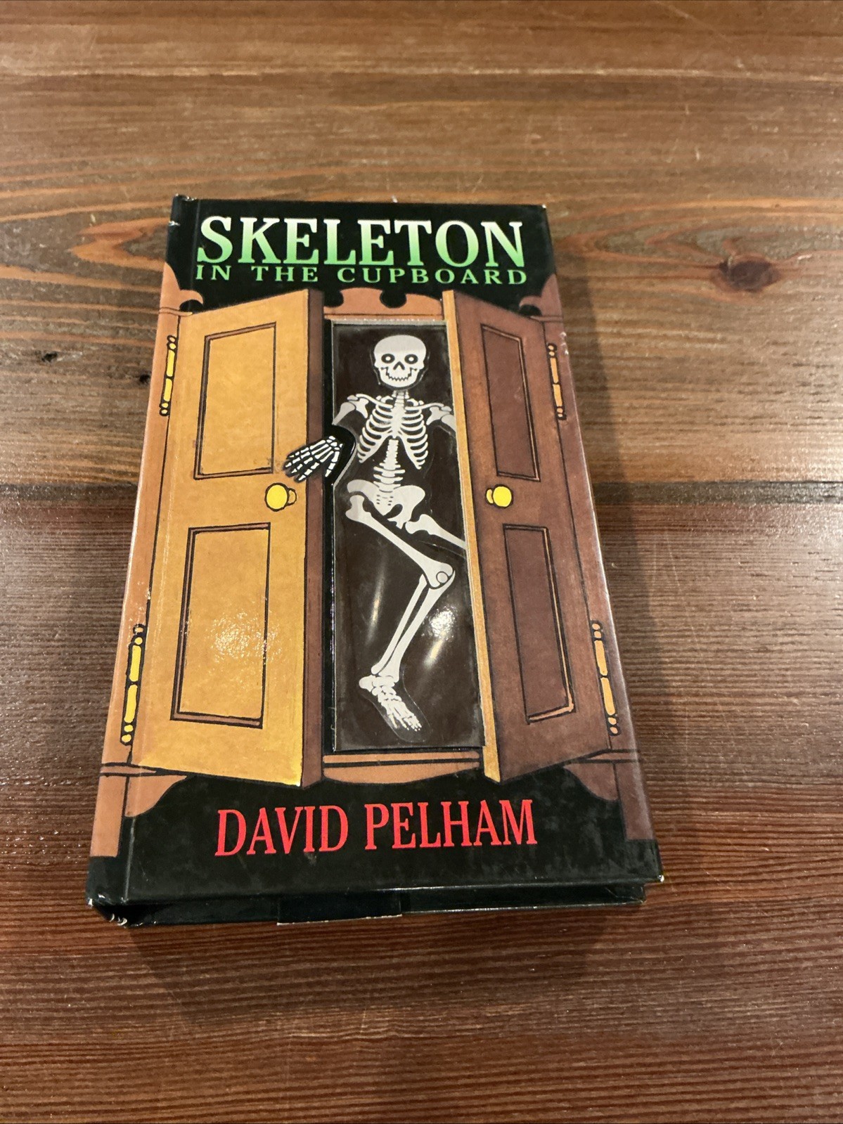 Skeleton in the Cupboard – Hardcover By Pelham, David – GOOD