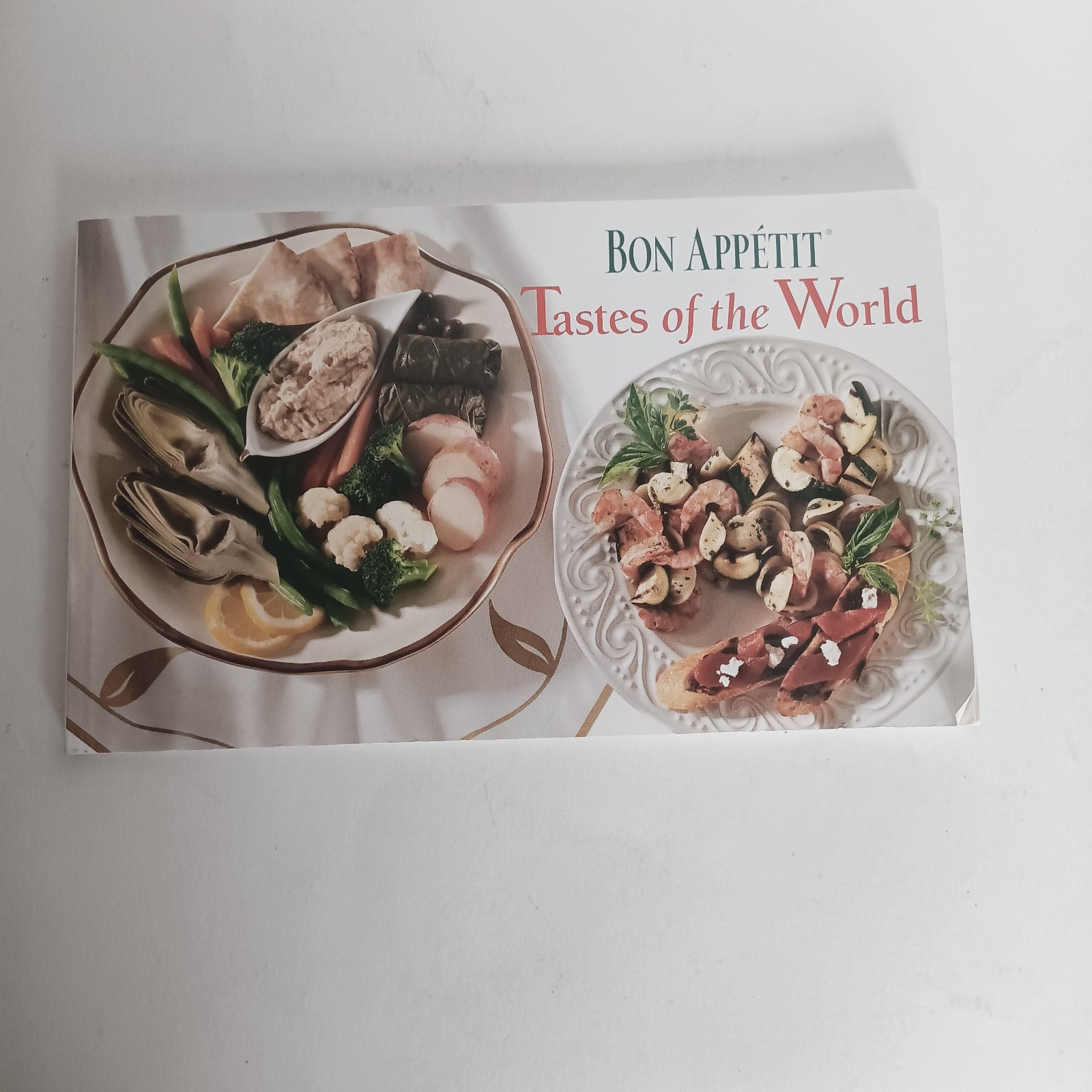 1996 BON APPETITE MINI COOKBOOK “TASTES OF THE WORLD” 102 PAGES
