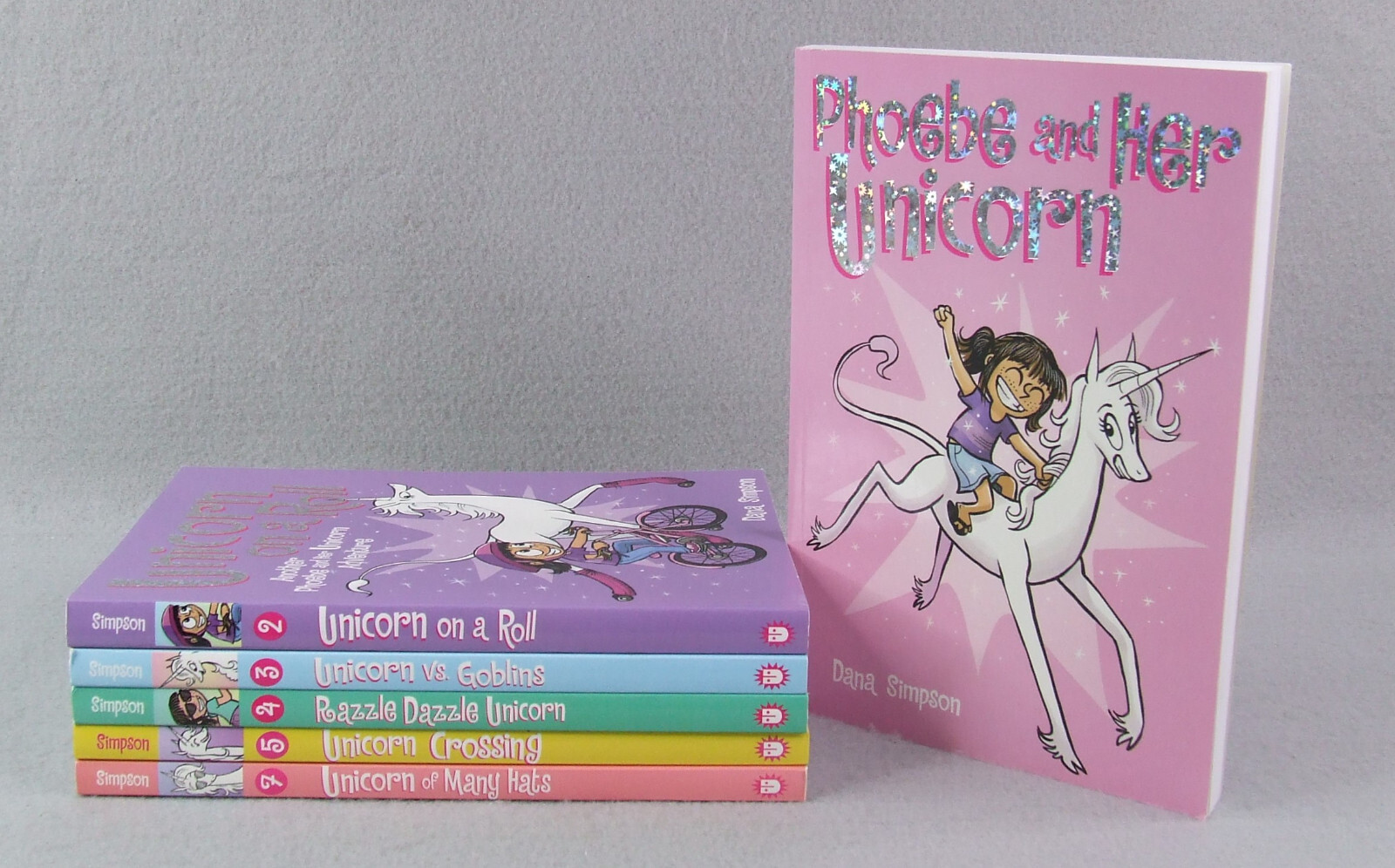 Phoebe and Her Unicorn Graphic Novels Volumes 1-5 and 7 by Dana Simpson