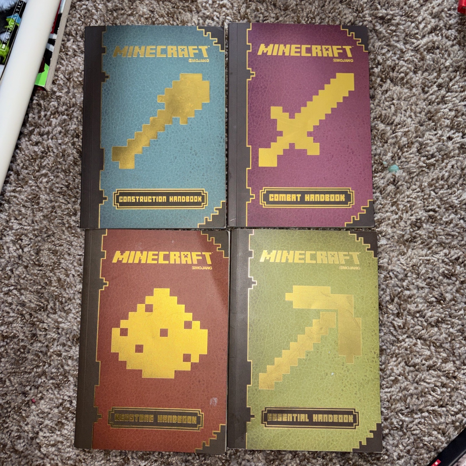 Minecraft Handbook Mojang 4 book set Essential, Construction, Redstone, & Combat