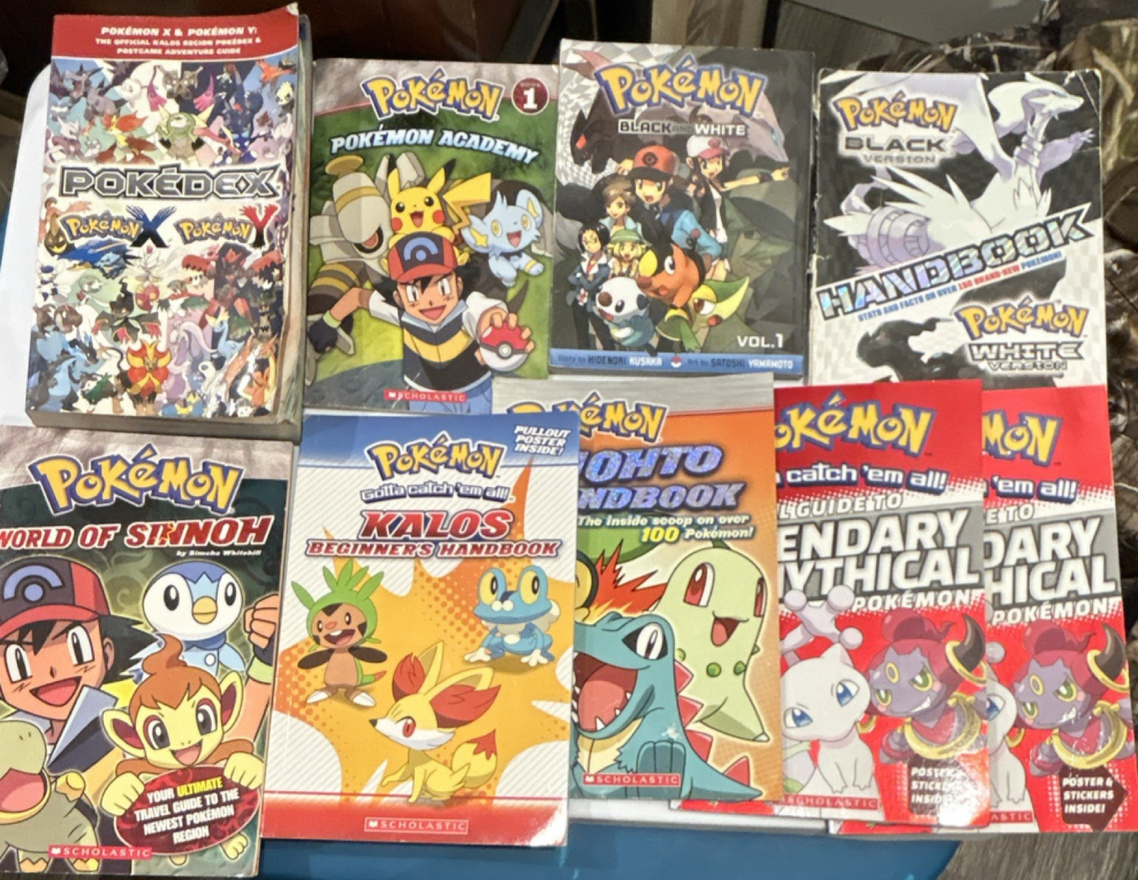 Lot of 9 Pokémon Handbooks Scholastic Paperback Pokédex bundle