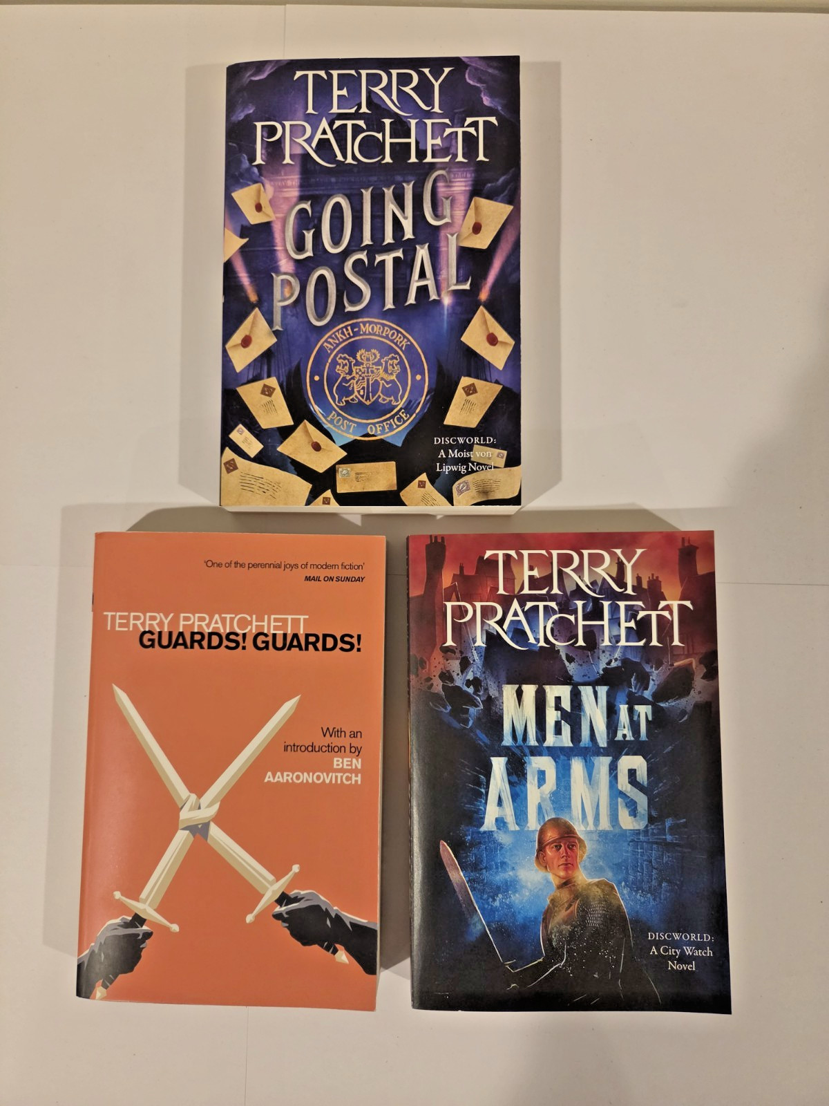 Terry Pratchett Paperback Lot: Guards! Guards! Men at Arms, Going Postal