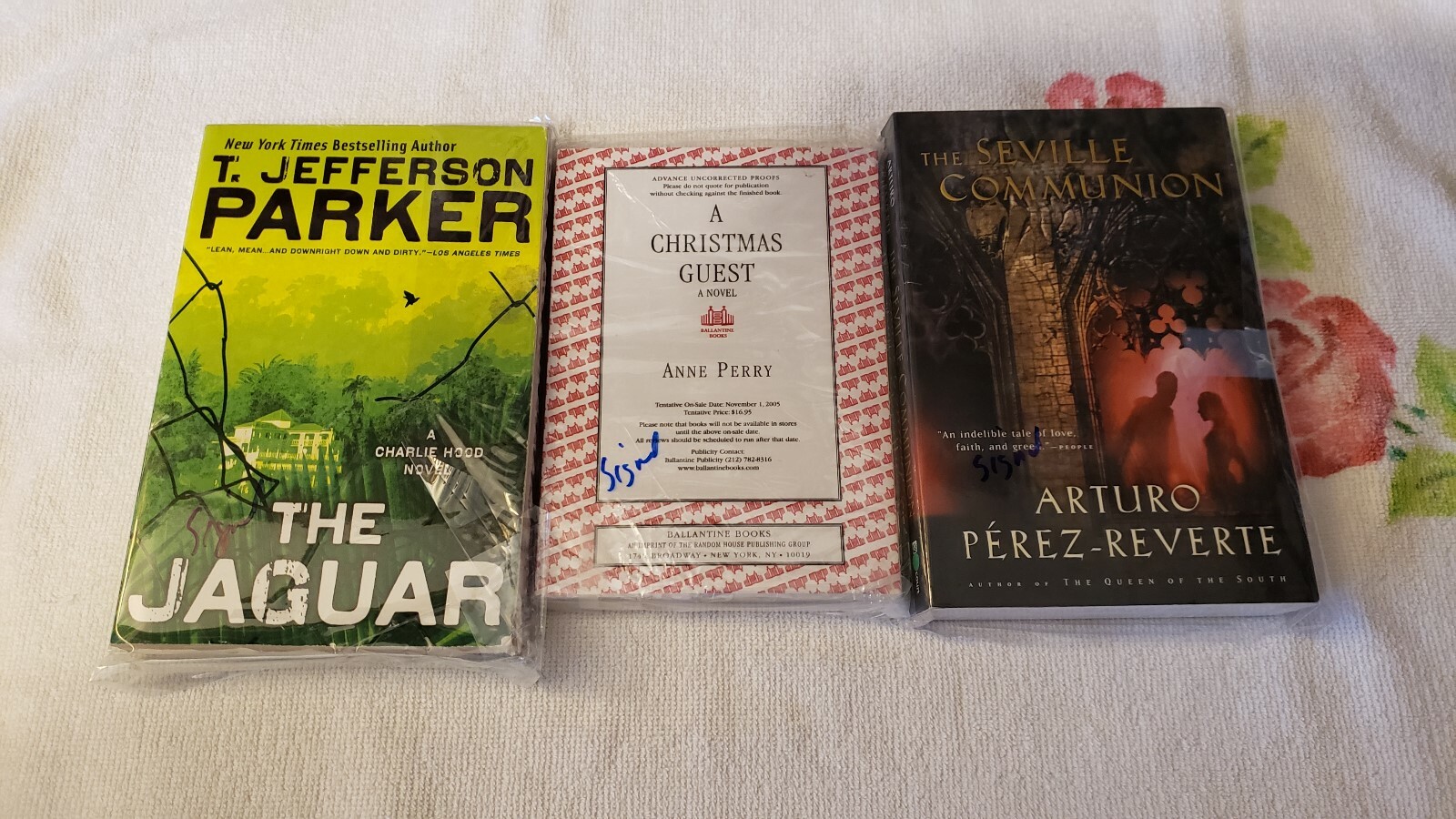 (3) – THREE SIGNED SOFTCOVER BOOKS by PEREZ-REVERTE, PARKER, & PERRY