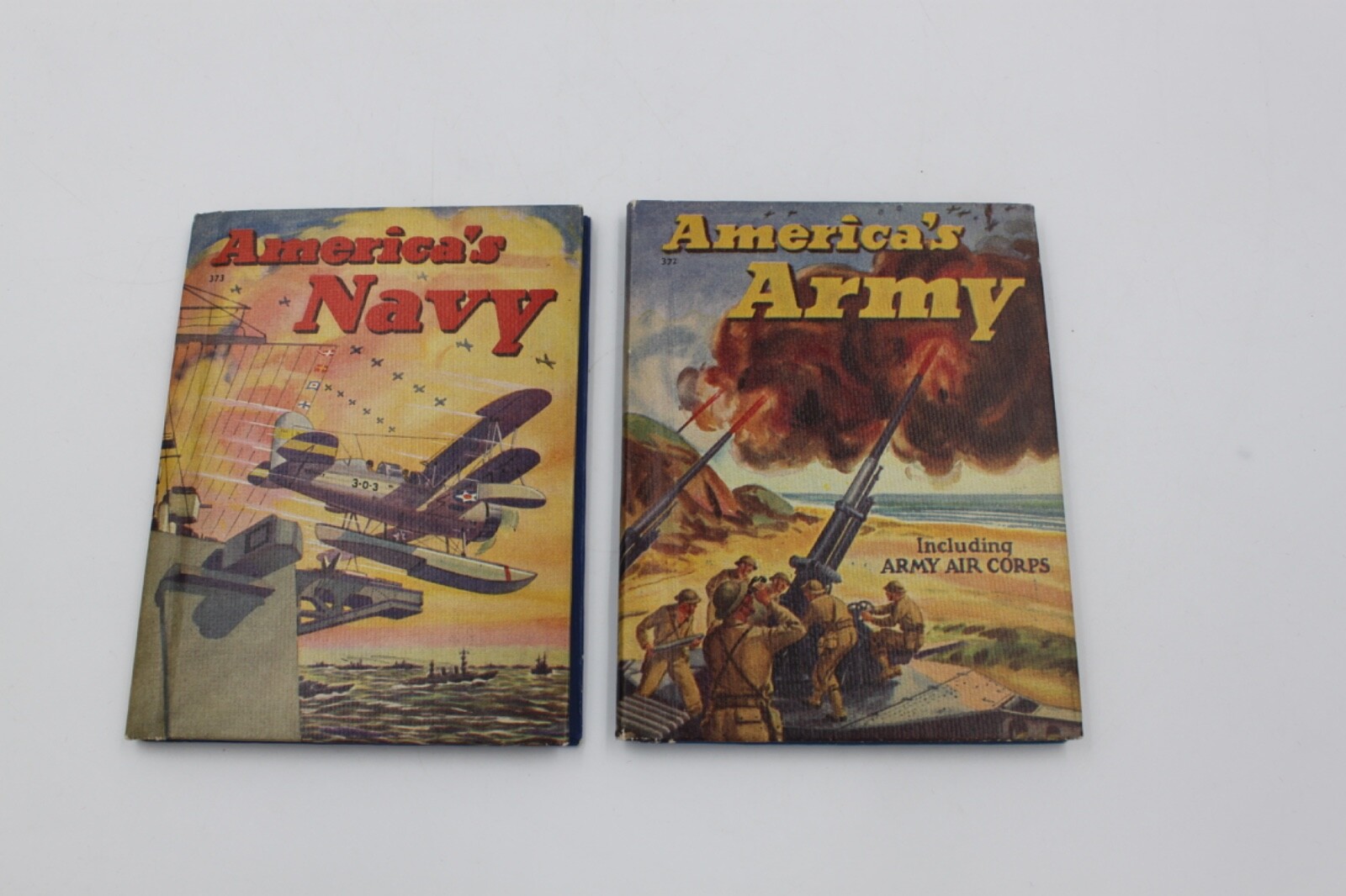 1942 America’s Army and America’s Navy pair of Books