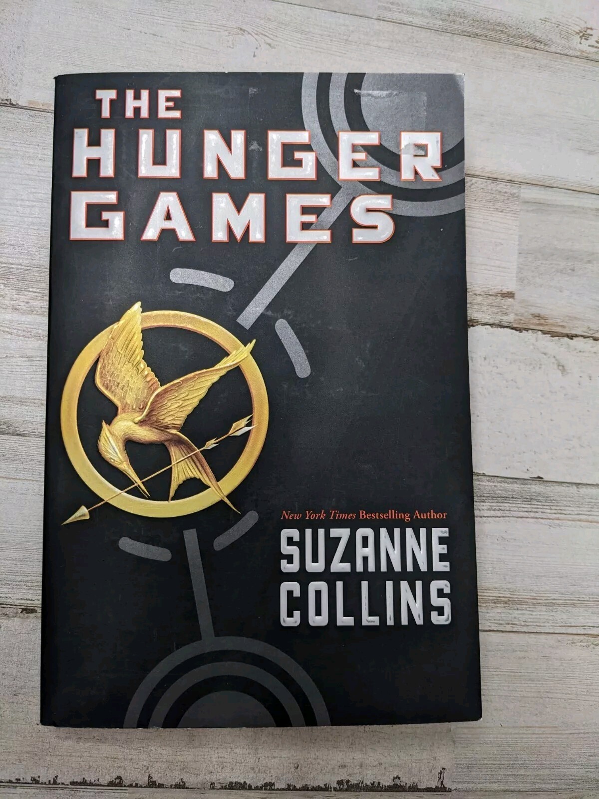 The Hunger Games (Book 1) – Paperback (1st edition) By Suzanne Collins