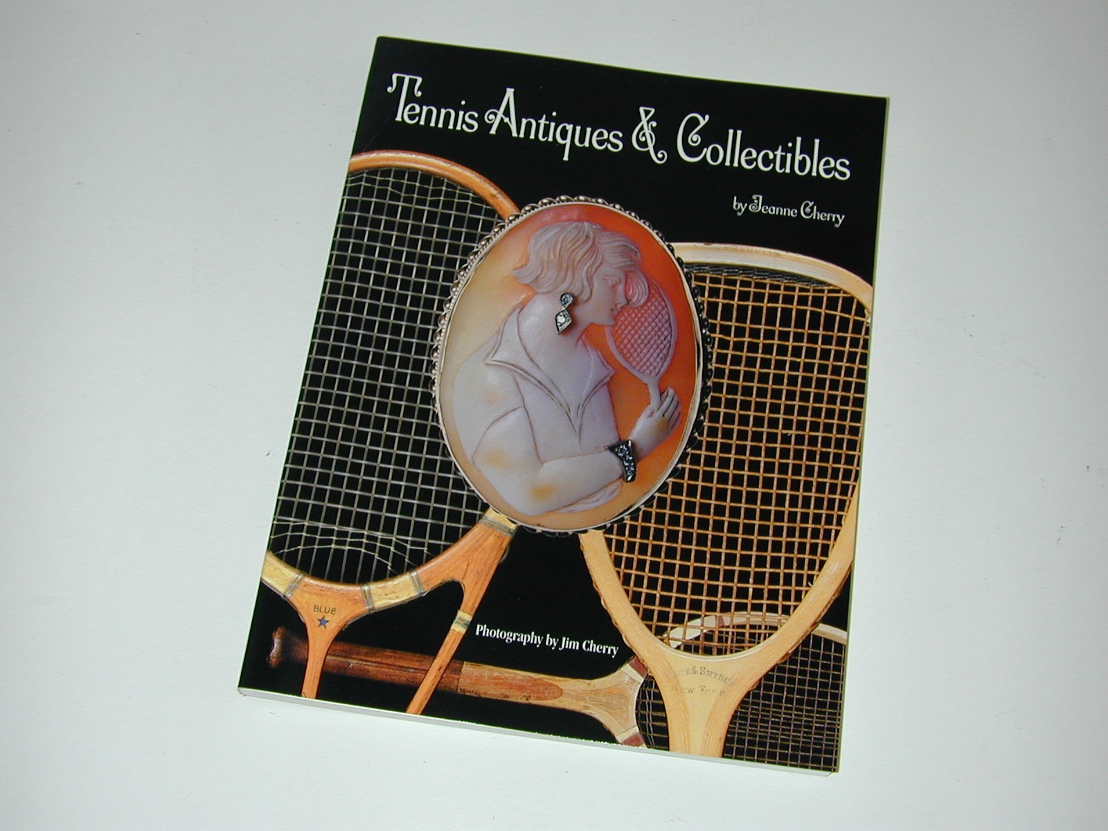 “Tennis Antiques & Collectibles” by Jeanne Cherry – 1995 – S/C – 1 Book