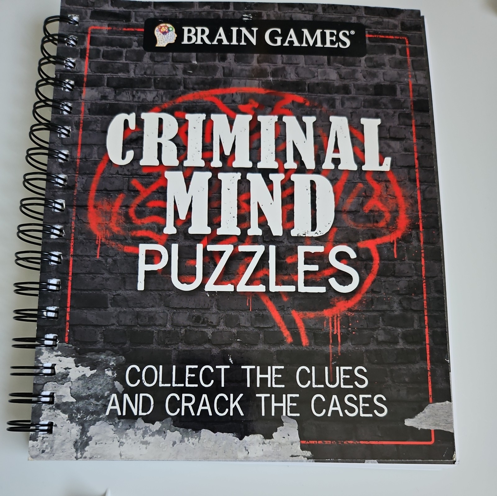 Brain Games – Criminal Mind Puzzles : Collect the Clues and Crack the Cases…